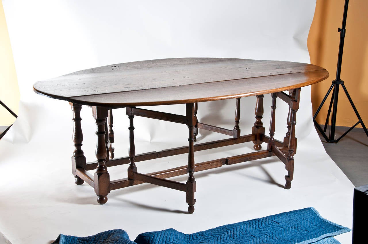 Large Vintage English Oval Drop Leaf Dining Table at 1stdibs